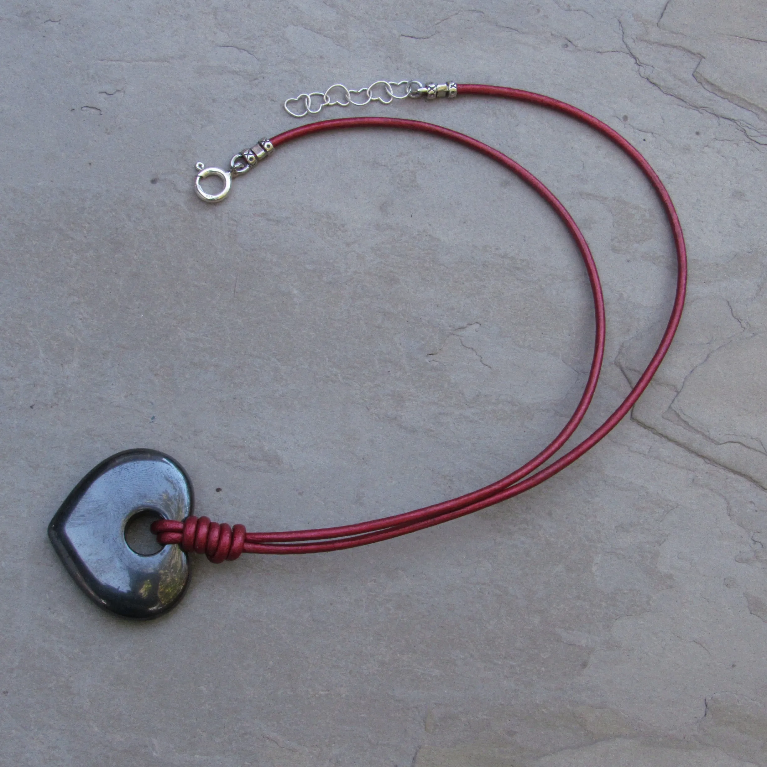 Hematite heart Hand Knotted on Metallic Red Leather With Sterling Silver Clasp