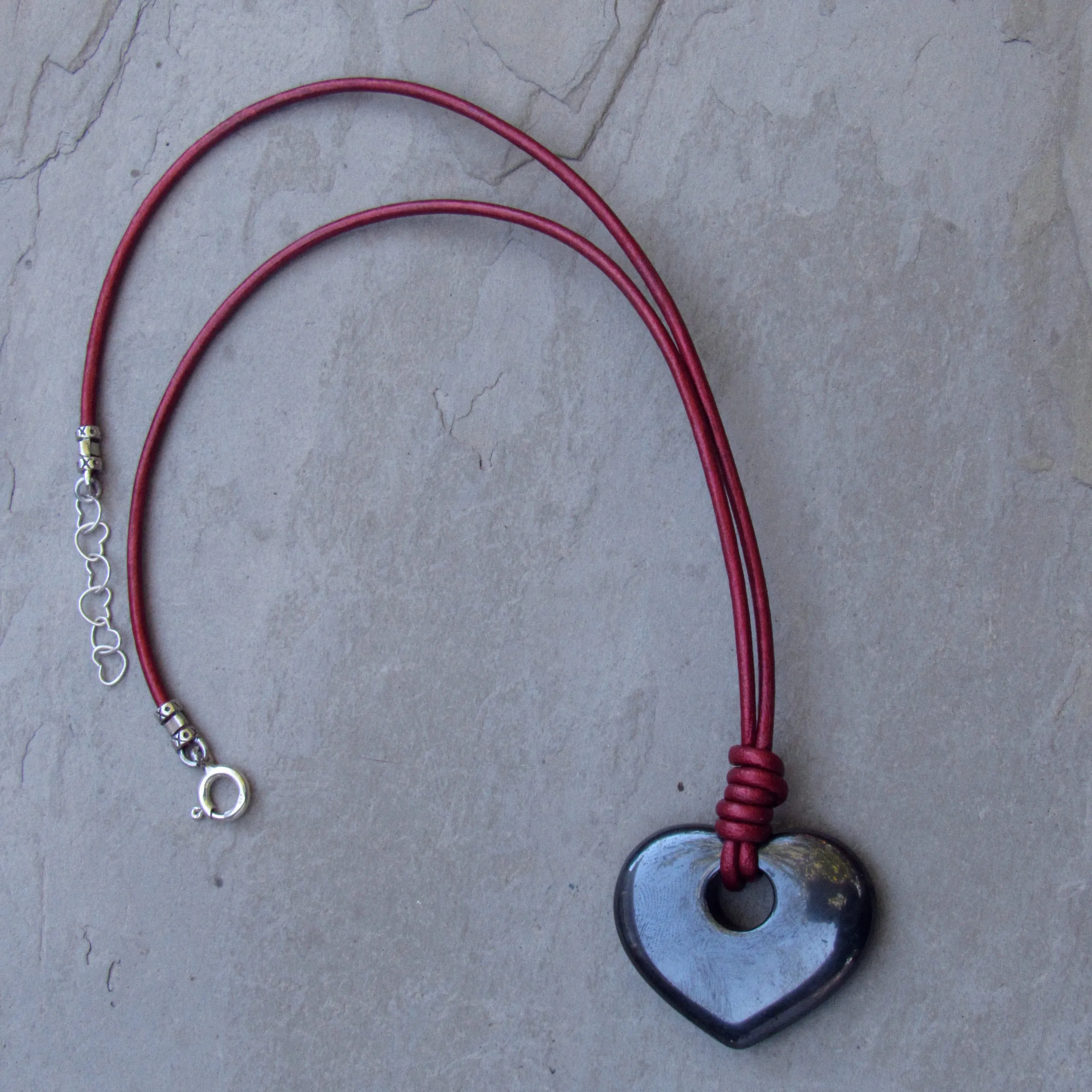 Hematite heart Hand Knotted on Metallic Red Leather With Sterling Silver Clasp